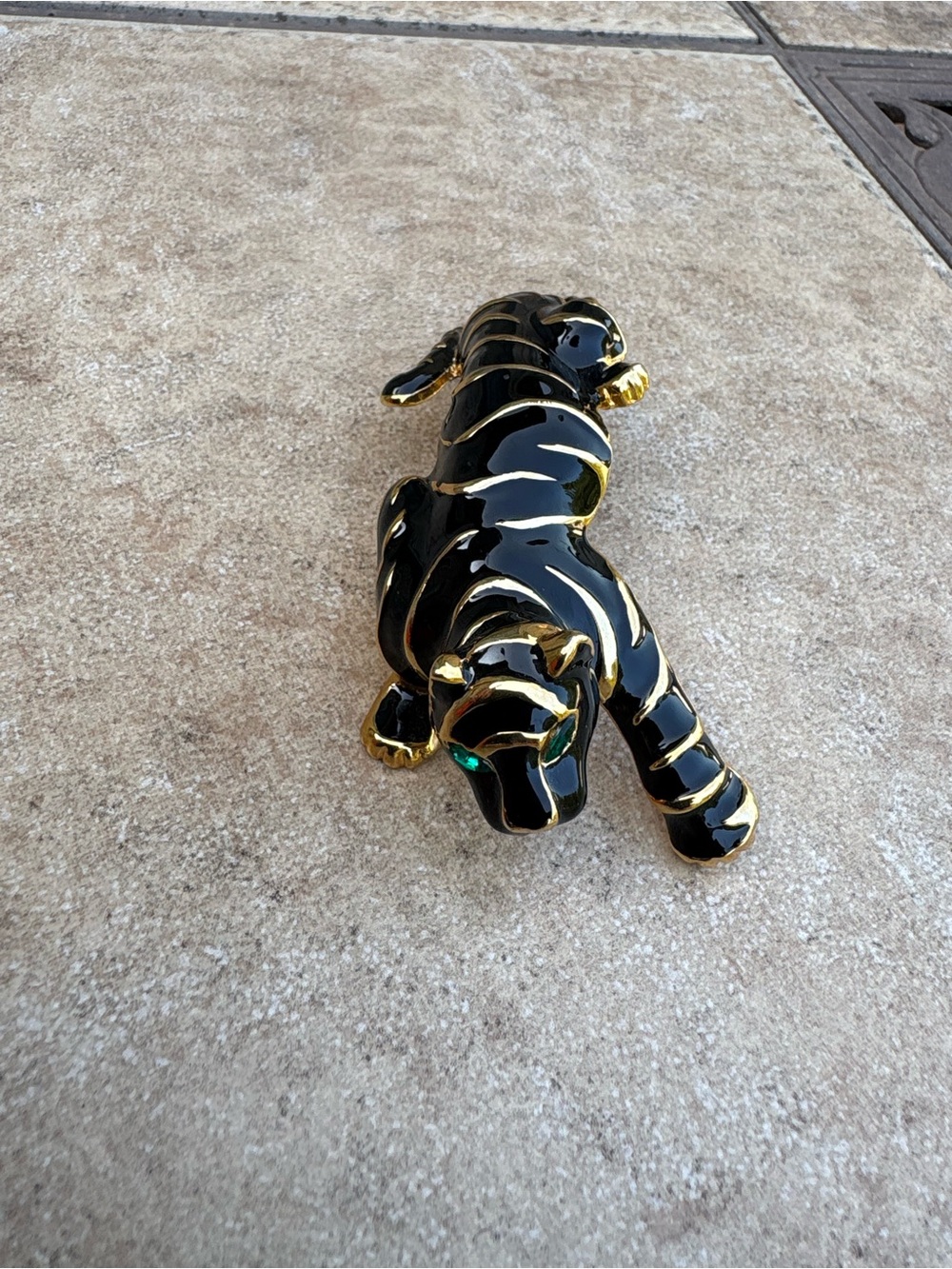 Black and Gold Climbing Tiger broach with Green Eyes. Vintage